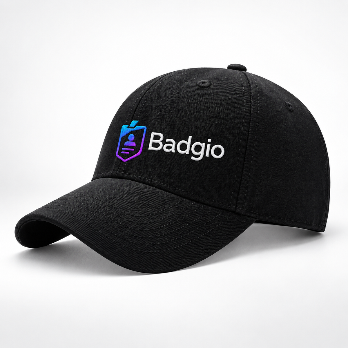 Black structured six-panel baseball cap with embroidered Badgio logo