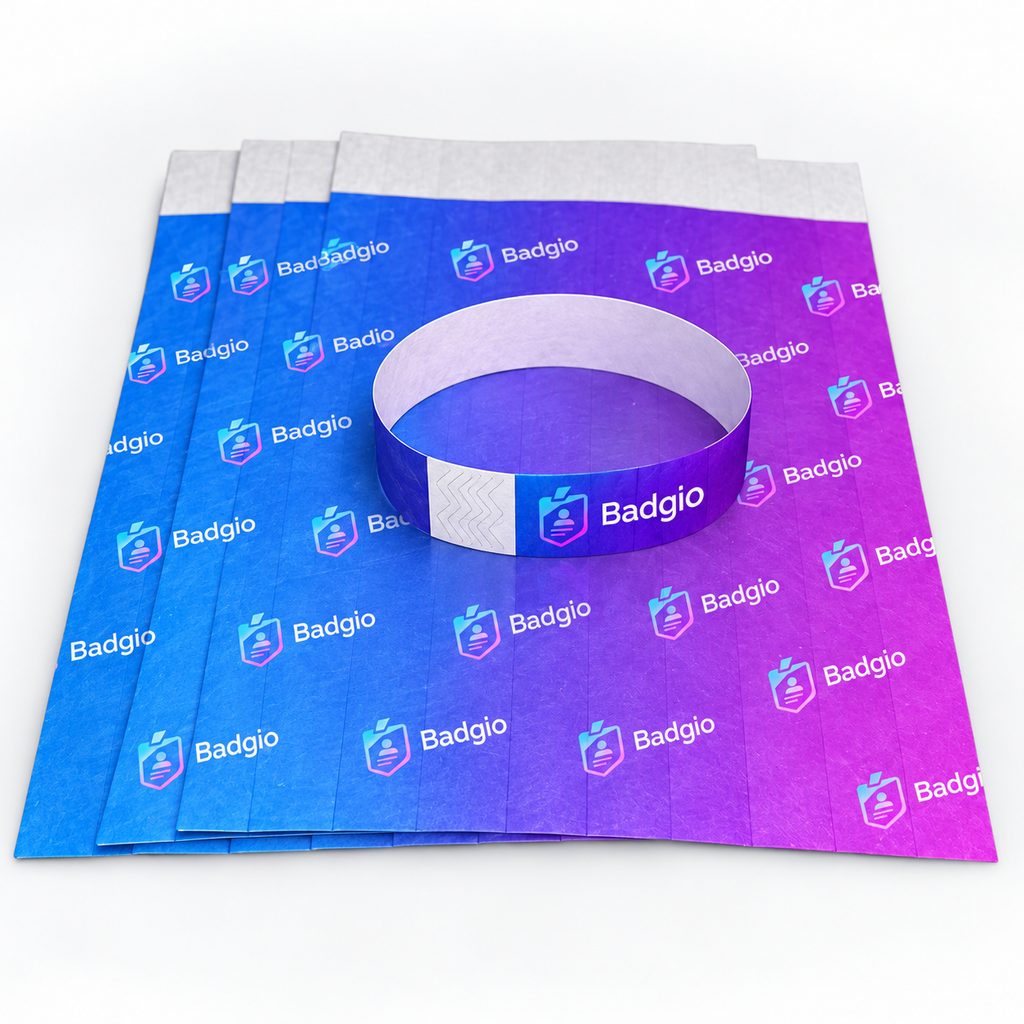 Stack of DuPont paper wristband sheets with one band formed into a loop