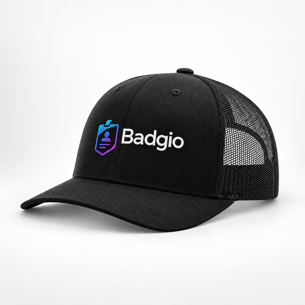 Black trucker cap with mesh back and embroidered Badgio logo