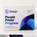 Custom 4 x 3 inch recyclable paper event badge with full-color Badgio artwork and three slots